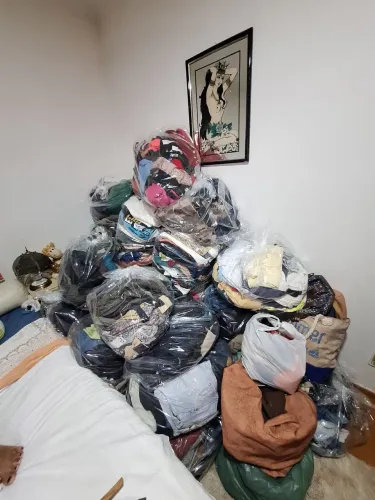 Lote de Roupas/Cabides