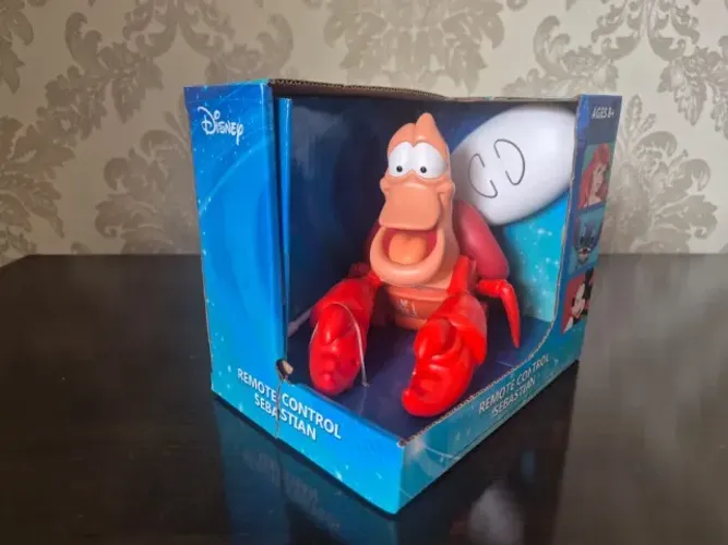 Boneco Sebastião Controle Remoto. Pequena Sereia. Disney