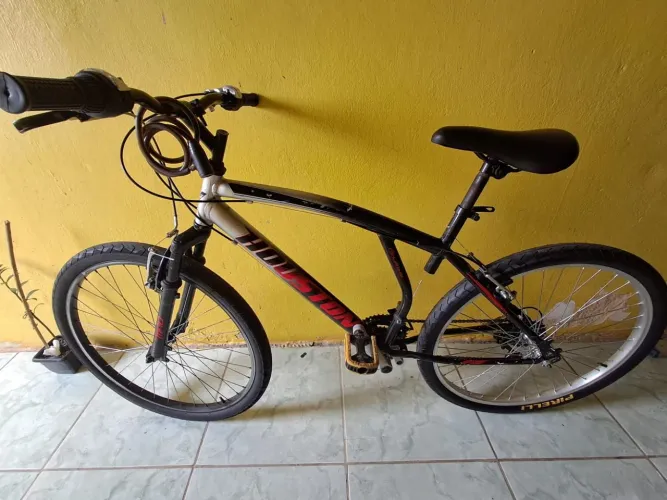 Vendo bicicleta Houston aro 26, 21 marchas estado de novo