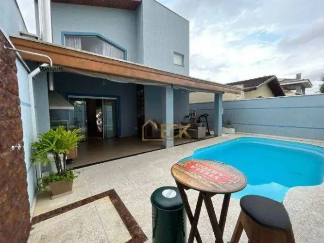 Sobrado com 3 dormitórios para alugar, 200 m² por R$ 7.496,80/mês - Loteamento Residencial