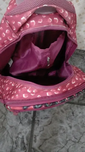 Mochila rosa com estampa floral