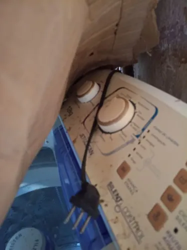 Máquina de lavar com defeito 
