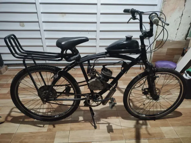 BICICLETA MOTORIZADA, UNICO DONO COM NOTA FISCAL.
