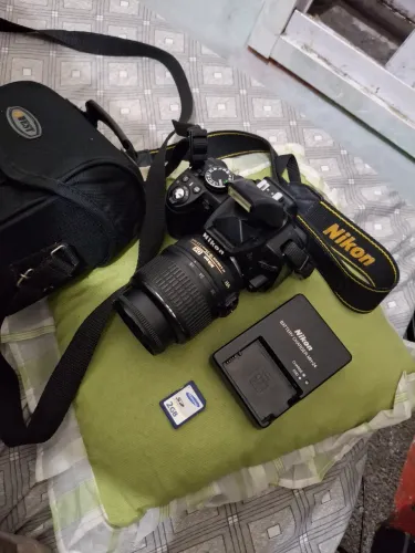 Camera nikon d3100 mais lente 18-55mm mais card mais bag