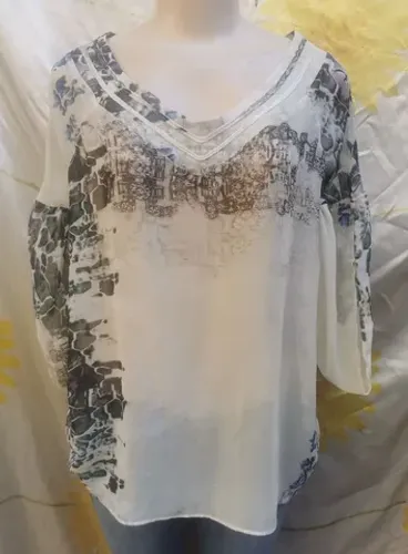  Blusa up mix estampas tam m/g