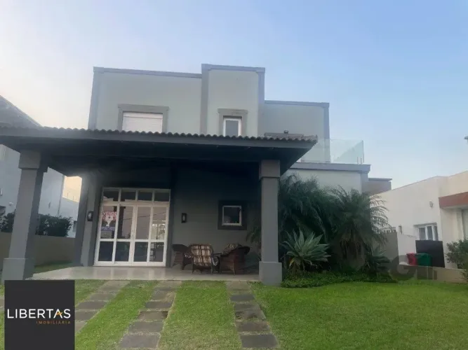 Casa de Condomínio em Atlântida Sul