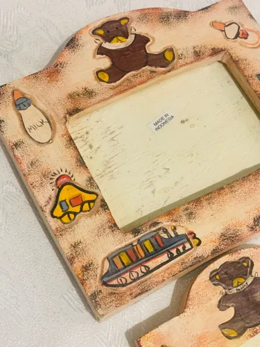 Porta Retrato Infantil, arte comprada na Indonésia
