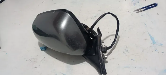 Retrovisor elétrico.