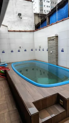 Casa com piscina 3 dormitórios Vila Guilhermina Praia Grande/SP