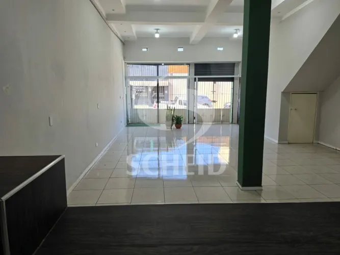 alão grande para locação no centro comercial do Jardim Suzano, com 100 mts e 2 vagas priva
