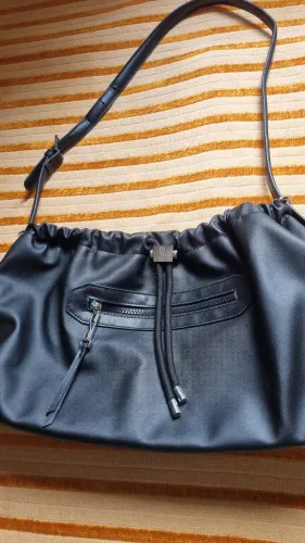 Bolsa Santa Lola original. Alça ajustável 