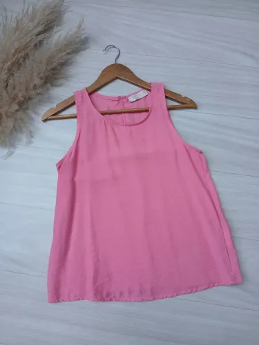 Regata feminina da CITY na cor rosa.<br>?Tam PP<br>?10,00
