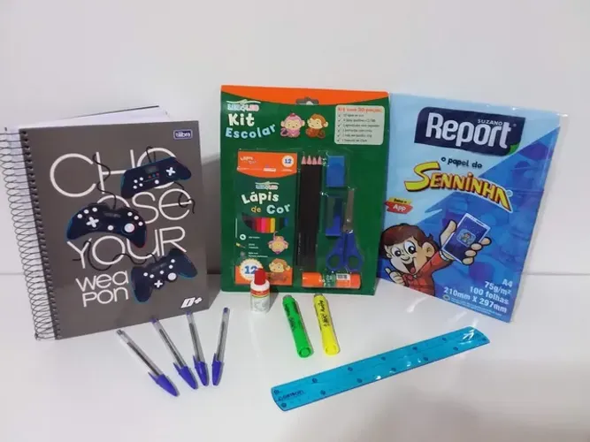 material escolar kit comp. leo + caderno + caneta + resma a4+régua+marcador texto+corretiv