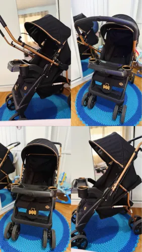 Carrinho de Bebê Preto com Dourado - Impecável