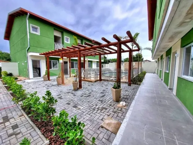 Sobrado com 2 dormitórios à venda, 97 m² por R$ 525.000,00 - Praia do Capricórnio - Caragu