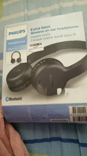Headphone e maquininha de cartão