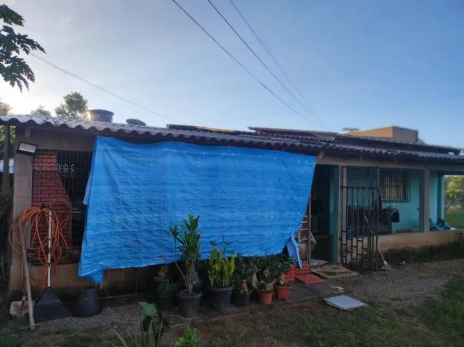 Vendo terreno 1650 com casa de 127,5 construída .