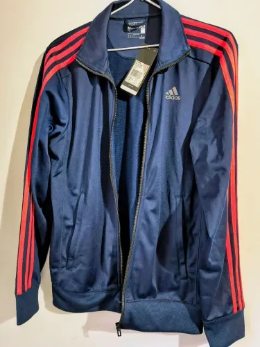 Agasalho Adidas apenas experimentado e ainda com a etiqueta-Leia a descrição abaixo