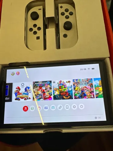 Nintendo switch oled desbloqueado completo com caixa com 2pro controle R e case
