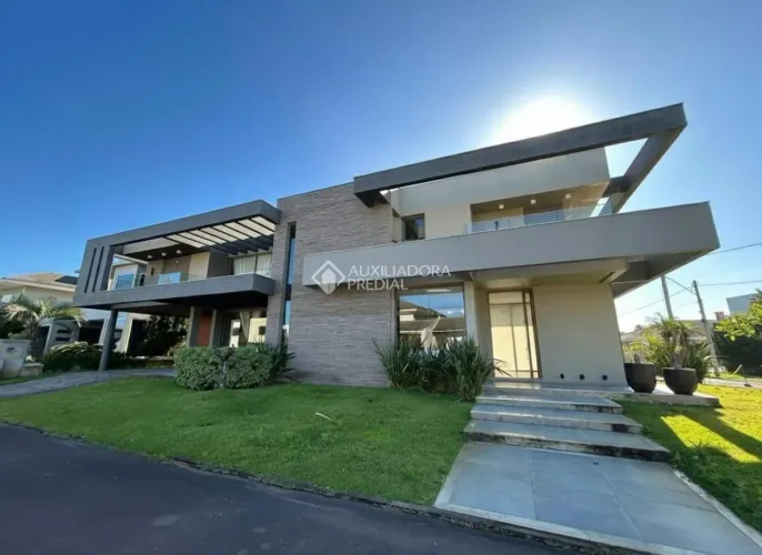 Casa em Condomínio , 5 suítes , vagas no Atlântico Villas Club.- Osorio