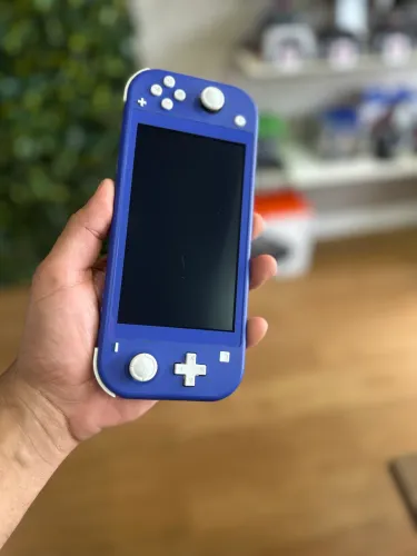 Nintendo Switch lite d. E. S. B. L. O. Q. U. E. A. D. O