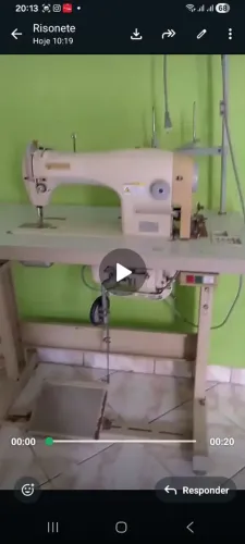 Máquina reta singer