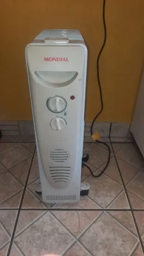 Aquecedor MONDIAL a óleo 127 v Funcionamento perfeitamente. v
