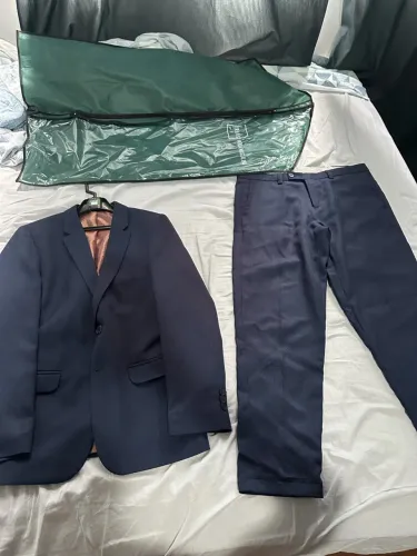 Terno Infantil cor azul escuro, veste 12 a 15 anos 1,70