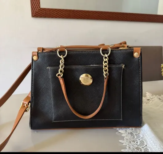 Bolsa Monica Sanches semi nova original 