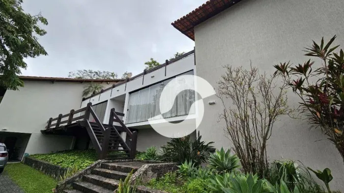 Casa com 5 dormitórios à venda, 870 m² por R$ 3.700.000,00 - Condomínio Jardim Ubá - Ubá I
