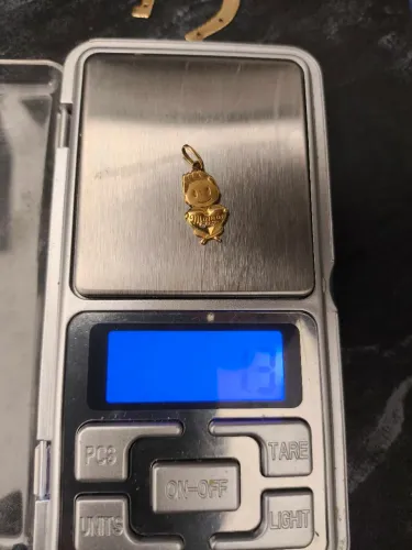 Pingente menino ouro 18k