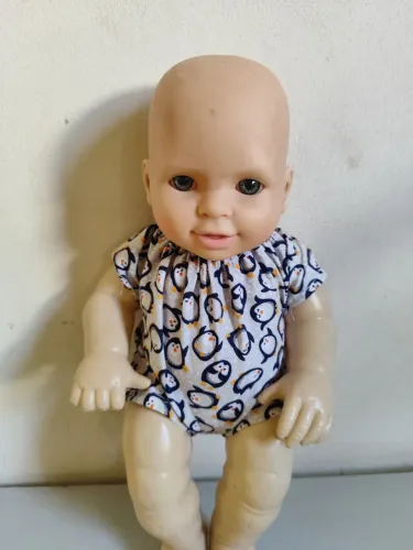 Boneco usado