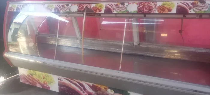 Balcão de exposição de cortês de carne