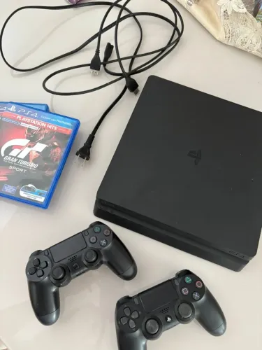 Playstation 4 + 2 controles + 2 jogos