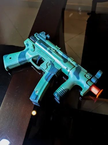 Brinquedo Arminha Lança Dardos Sucção MP5 de Plástico