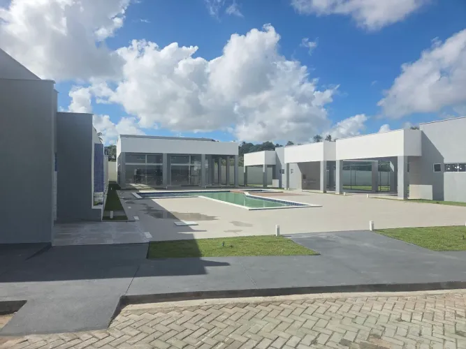 Repasso lote no condomínio Village premium