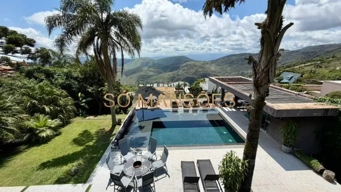 CASA À VENDA NO CONDOMÍNIO MORRO DO CHAPÉU  APROX. 600M² CONSTRUÍDOS E 82M² DE HABITE-SE.