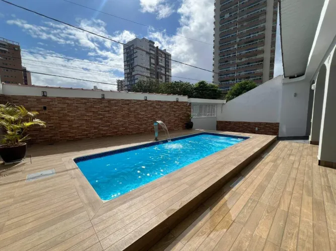 Casa à venda, 157 m² por R$ 1.098.000,00 - Vila Guilhermina - Praia Grande/SP