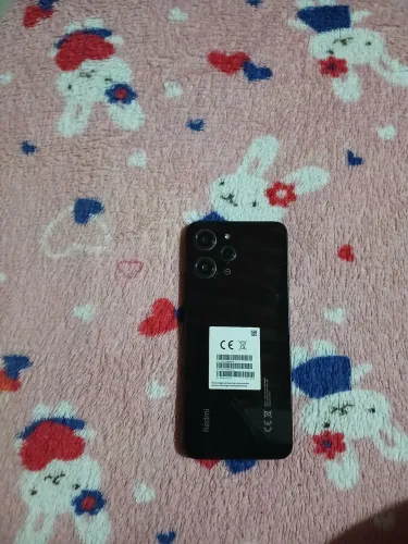 Redmi 12 256GB, tela queimada, está tando sinal, vibra quanto liga