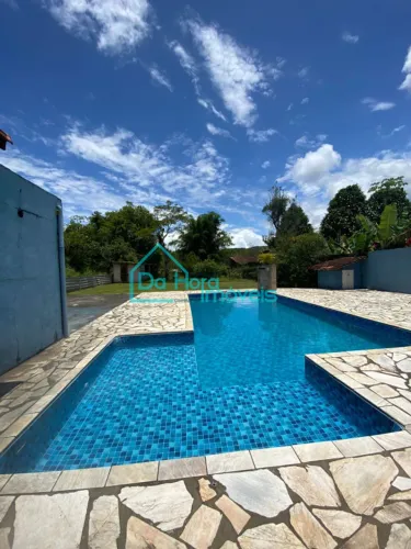 Chácara com 4 quartos, 4 banheiros, lago de peixe, piscina, área gourmet a venda em Mongag