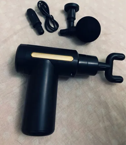 Pistola de massagem excelente pra aliviar dores musculares ou fazer massagem ( NOVO )