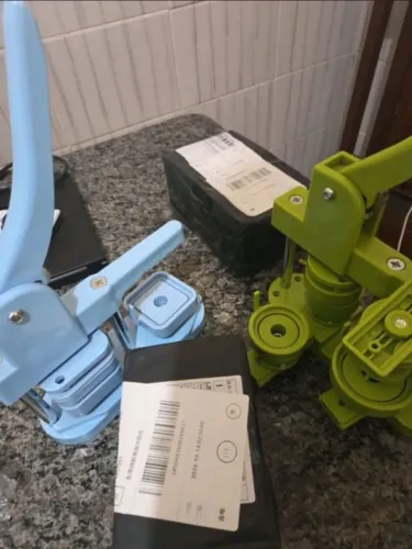 Máquina de bottons e suprimentos