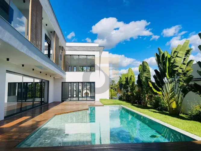 Casa com 4 suítes, 540 m² - venda por R$ 6.800.000 ou aluguel por R$ 48.470/mês - Loteamen