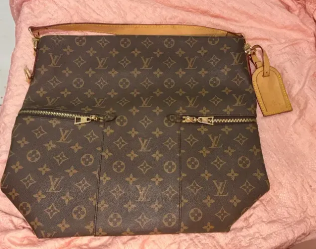 Bolsa monograma exclusiva grande premium louis vuitton usada conservada