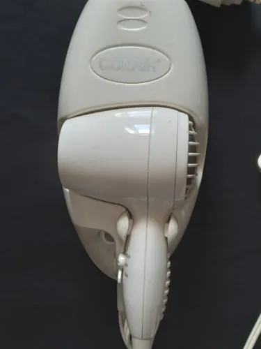 Secador de cabelo de parede Conair.