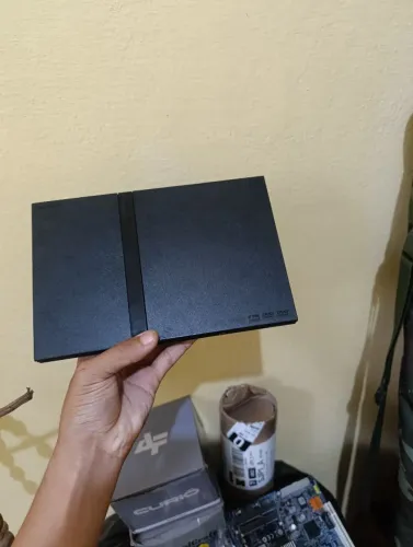 PS2 slim com defeito