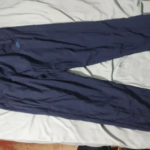 Calça Nike corta vento