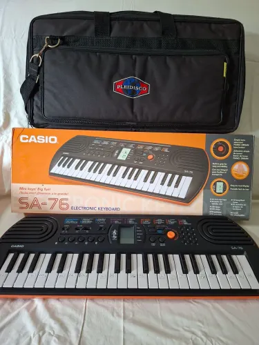 Teclado Musical Casio SA-76 com fonte Casio original 