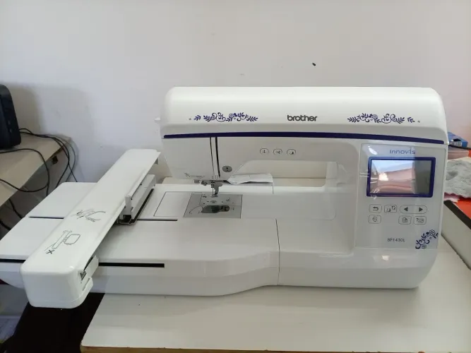 Máquina de bordar brother 1430