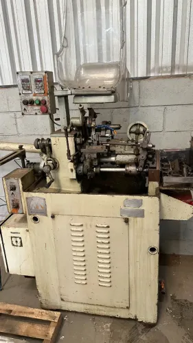 Torno automatico  Atlas A25 com cabeçote Ano: 2007